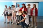 увеличить