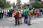 увеличить