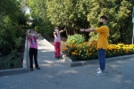 увеличить
