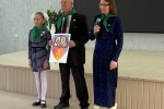 увеличить