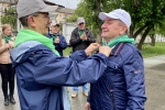 увеличить