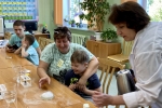 увеличить