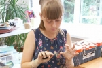 увеличить