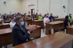 увеличить