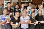 увеличить
