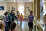 увеличить