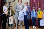 увеличить