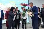 увеличить