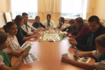 увеличить