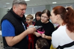 увеличить