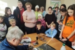 увеличить